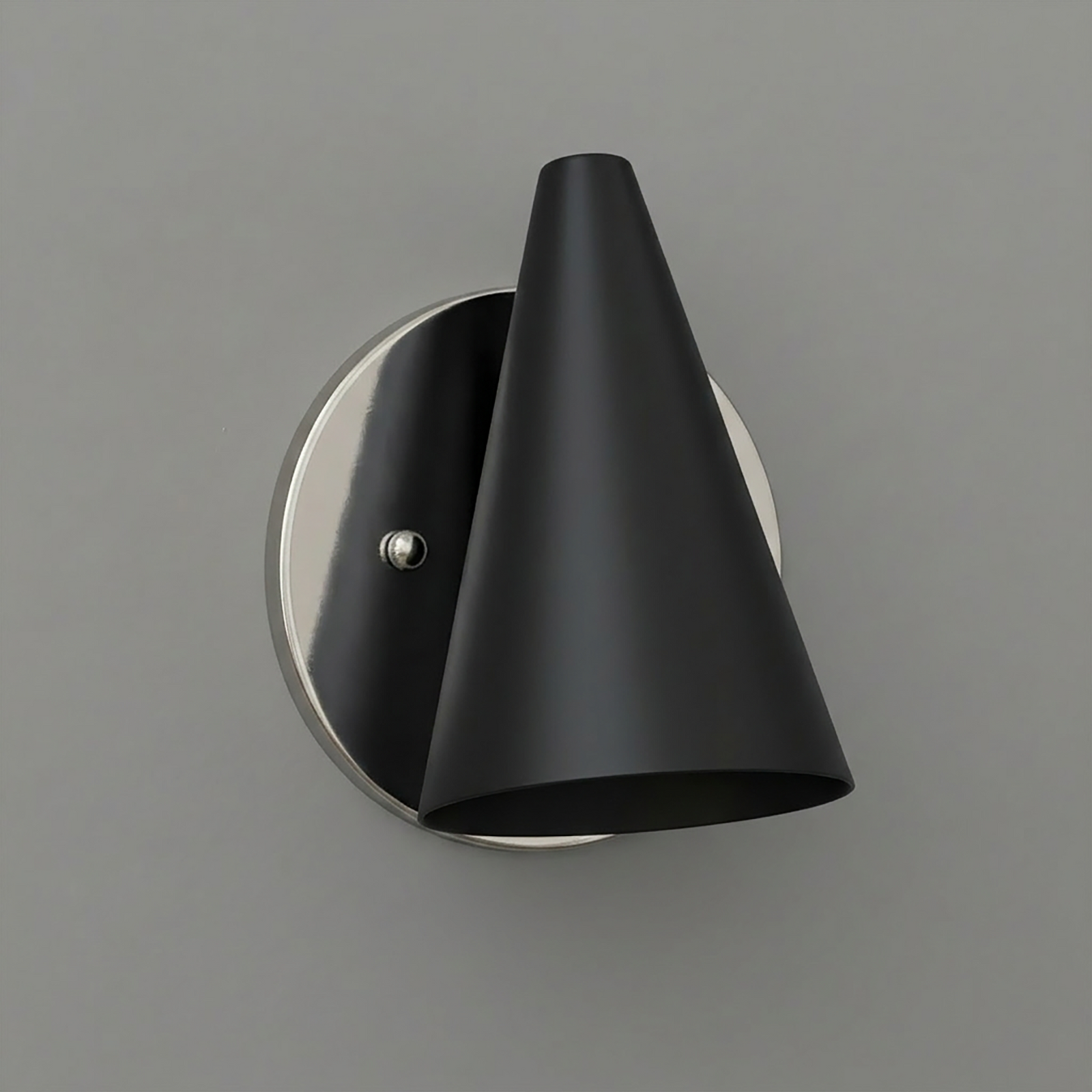 Matte black conical metal wall sconce with round brushed nickel backplate and single bulb fixture. - SCONCE MODEL NO. 5950