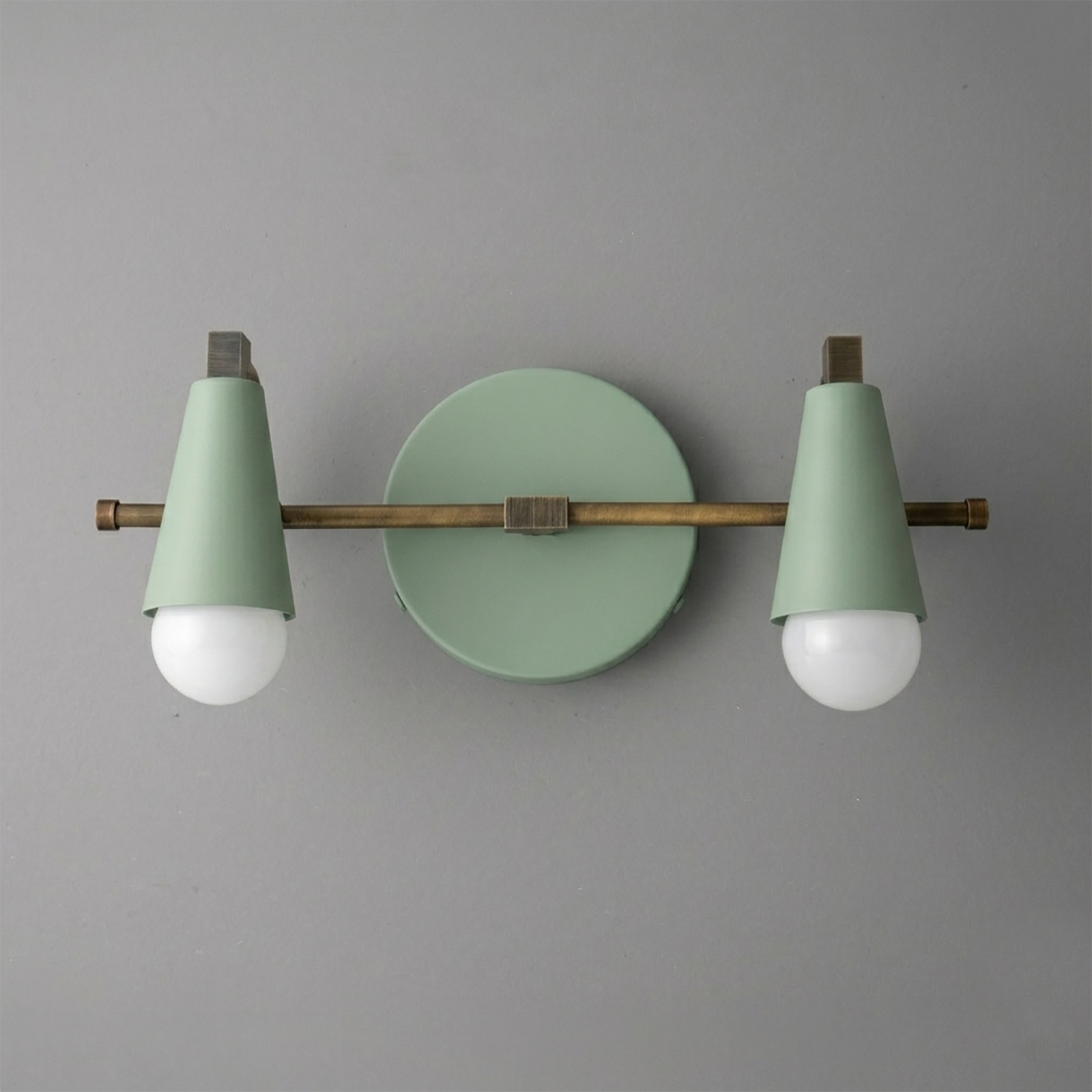 Scandinavian-style vanity light with mint green conical shades and brass horizontal rod mounting two exposed bulbs. - VANITY LIGHT MODEL NO. 1229