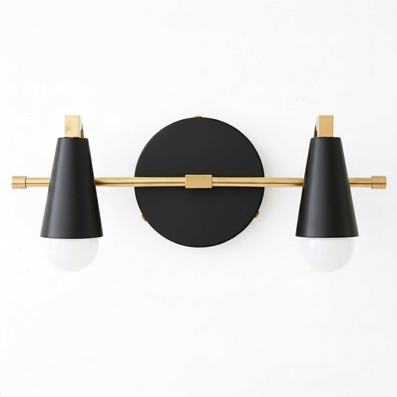 Black and brass industrial vanity light with two cone-shaped shades and exposed bulbs. - VANITY LIGHT MODEL NO. 1229