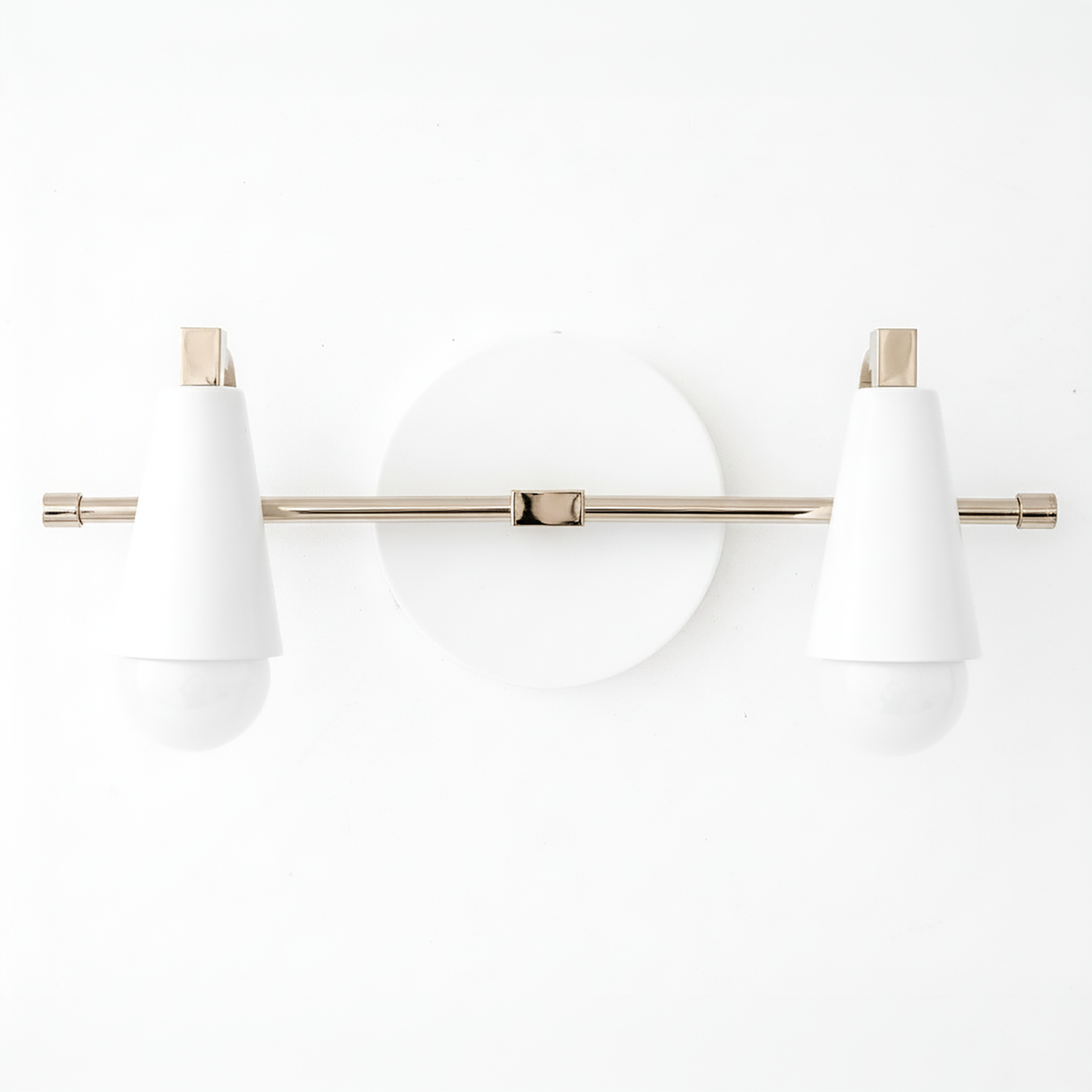 Two-bulb vanity light with white conical shades and brushed nickel horizontal bar mounted on round white base. - VANITY LIGHT MODEL NO. 1229