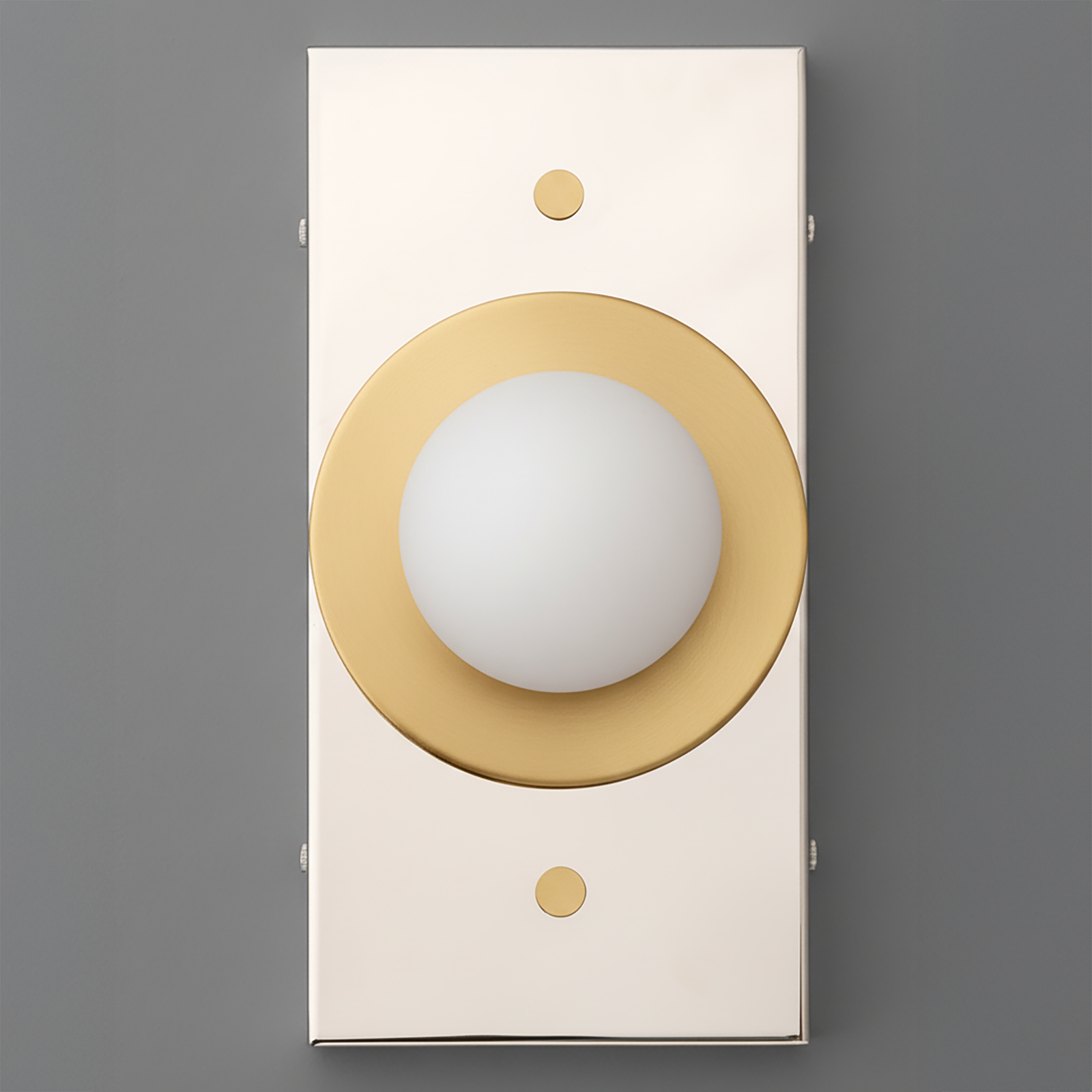 Minimalist wall sconce with a cream rectangular backplate and a round frosted globe light surrounded by an antique brass ring. - SCONCE MODEL NO. 4474
