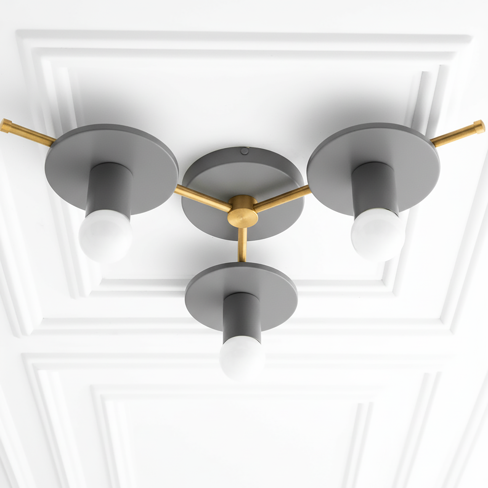 Mid-century modern flush mount chandelier with three bare white bulbs, matte gray and brass finish. - CHANDELIER MODEL NO. 9526