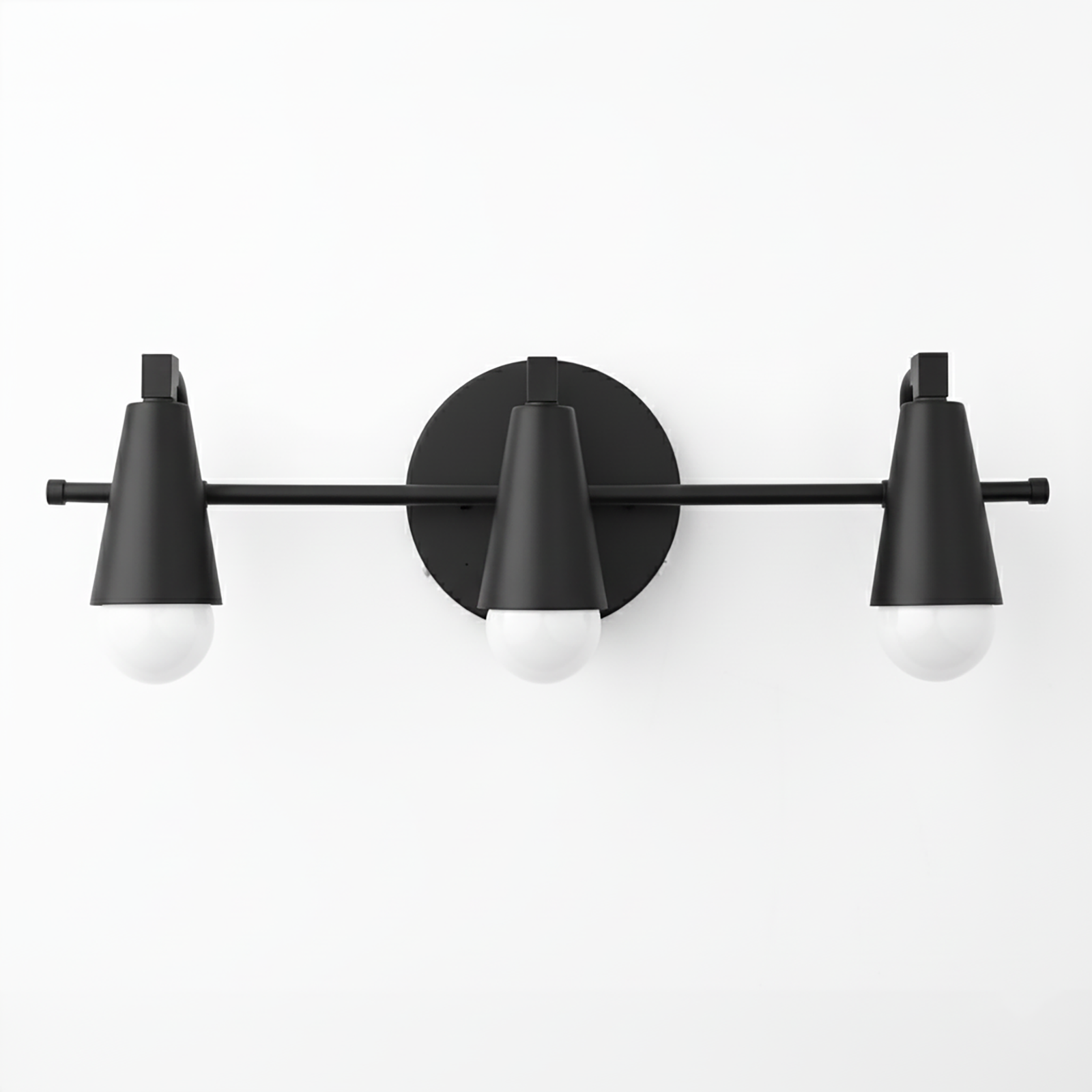 Black metal vanity light with three conical shades and exposed white bulbs in mid-century modern style. - VANITY LIGHT MODEL NO. 8084