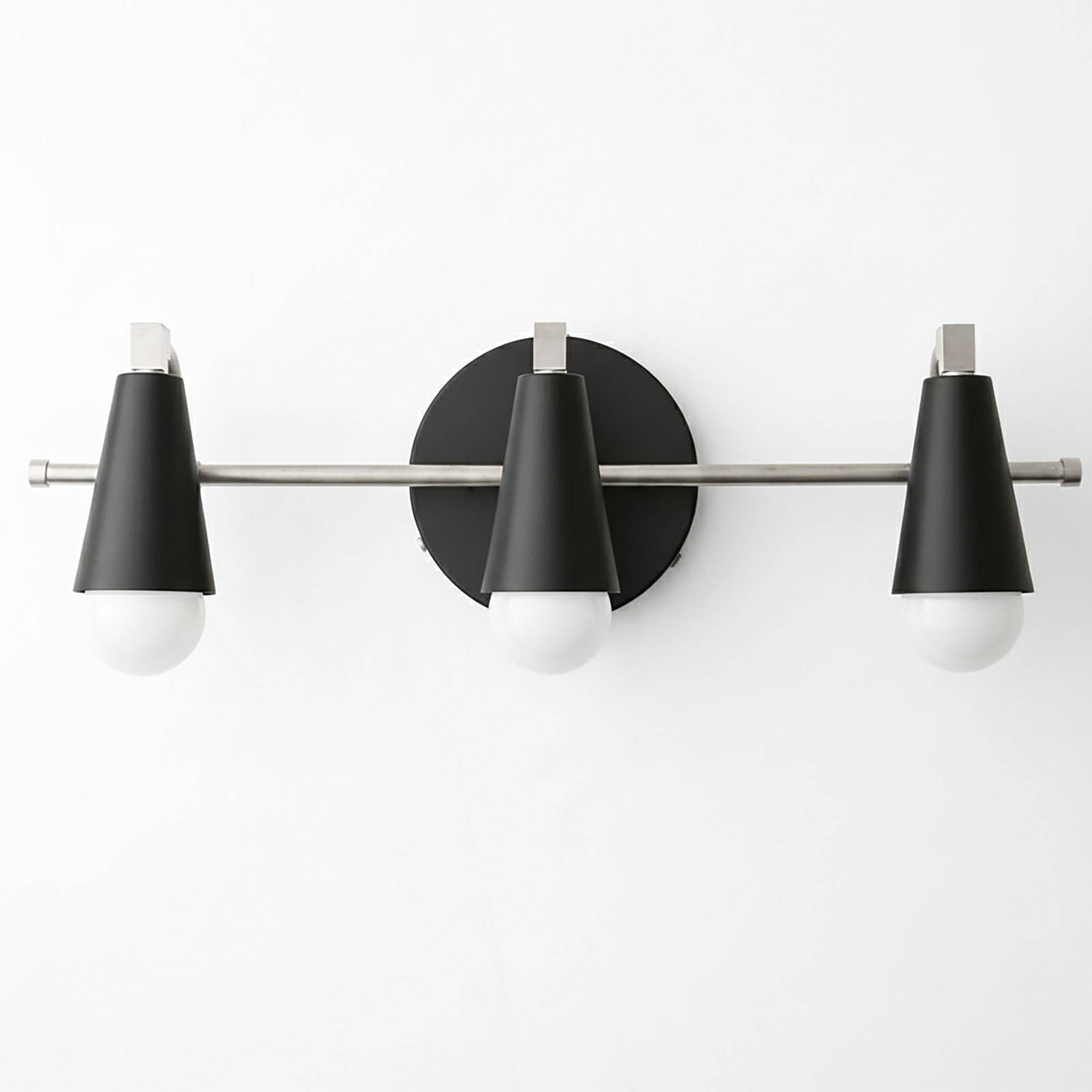 Three-bulb vanity light with matte black conical shades and brushed nickel horizontal rod and round wall mount. - VANITY LIGHT MODEL NO. 8084