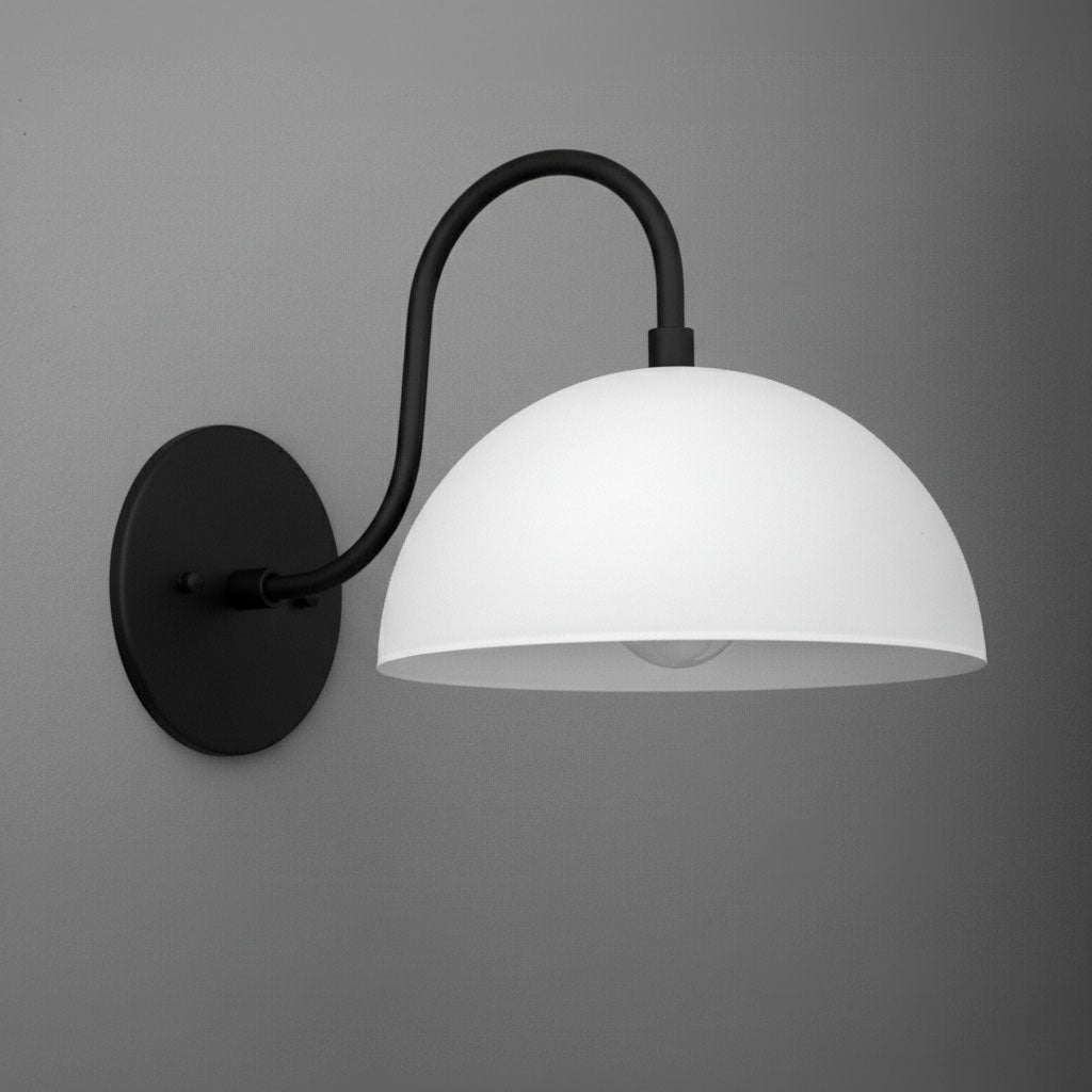 Black metal wall sconce with a curved arm and a smooth white dome-shaped shade. - SCONCE MODEL NO. 9092