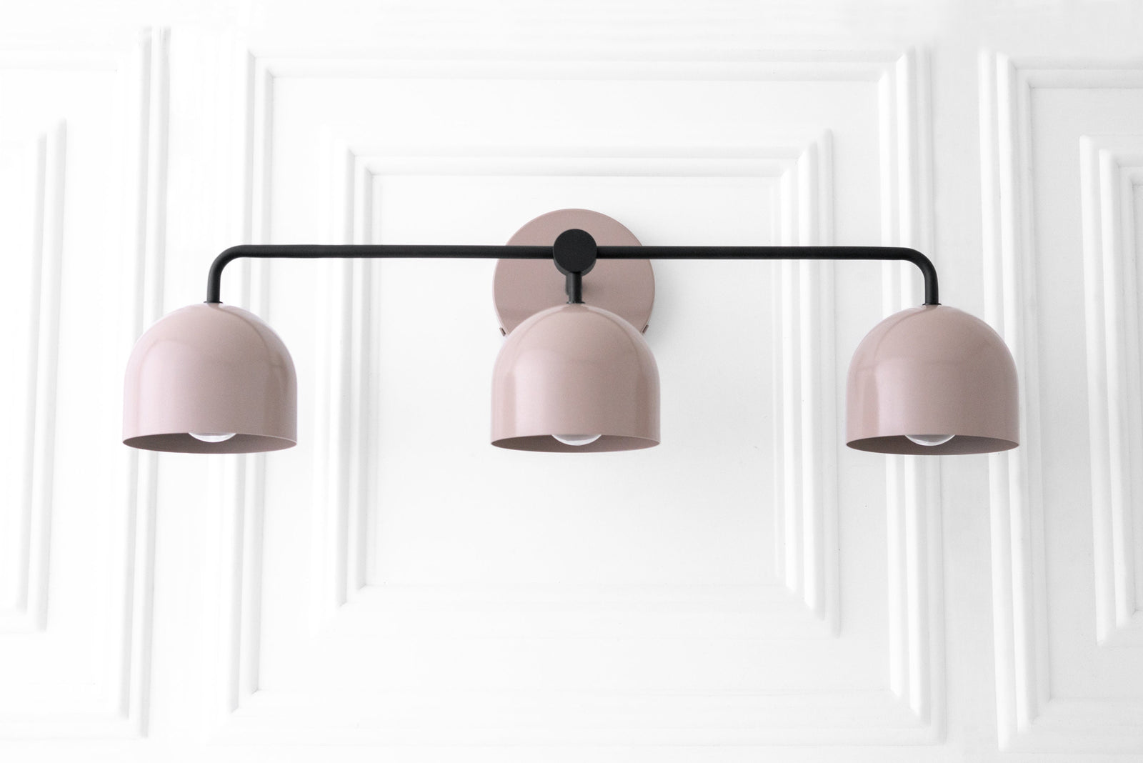 Mid-century modern 3-bulb vanity light in mauve with matte black horizontal bar and mounts. - VANITY LIGHT MODEL NO. 7456