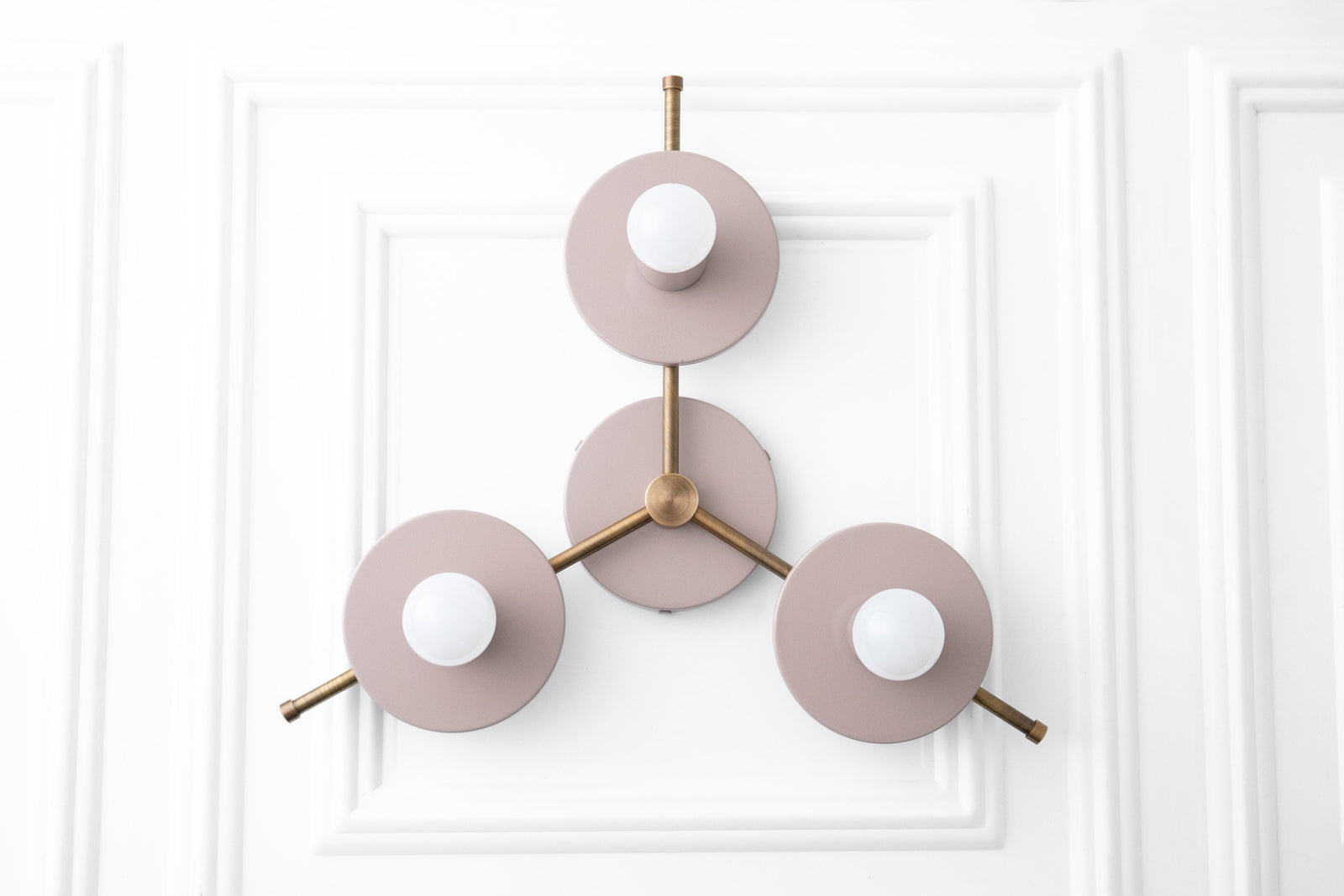 Mid-century modern chandelier with three mauve circular metal shades and antique brass accents. - CHANDELIER MODEL NO. 9526