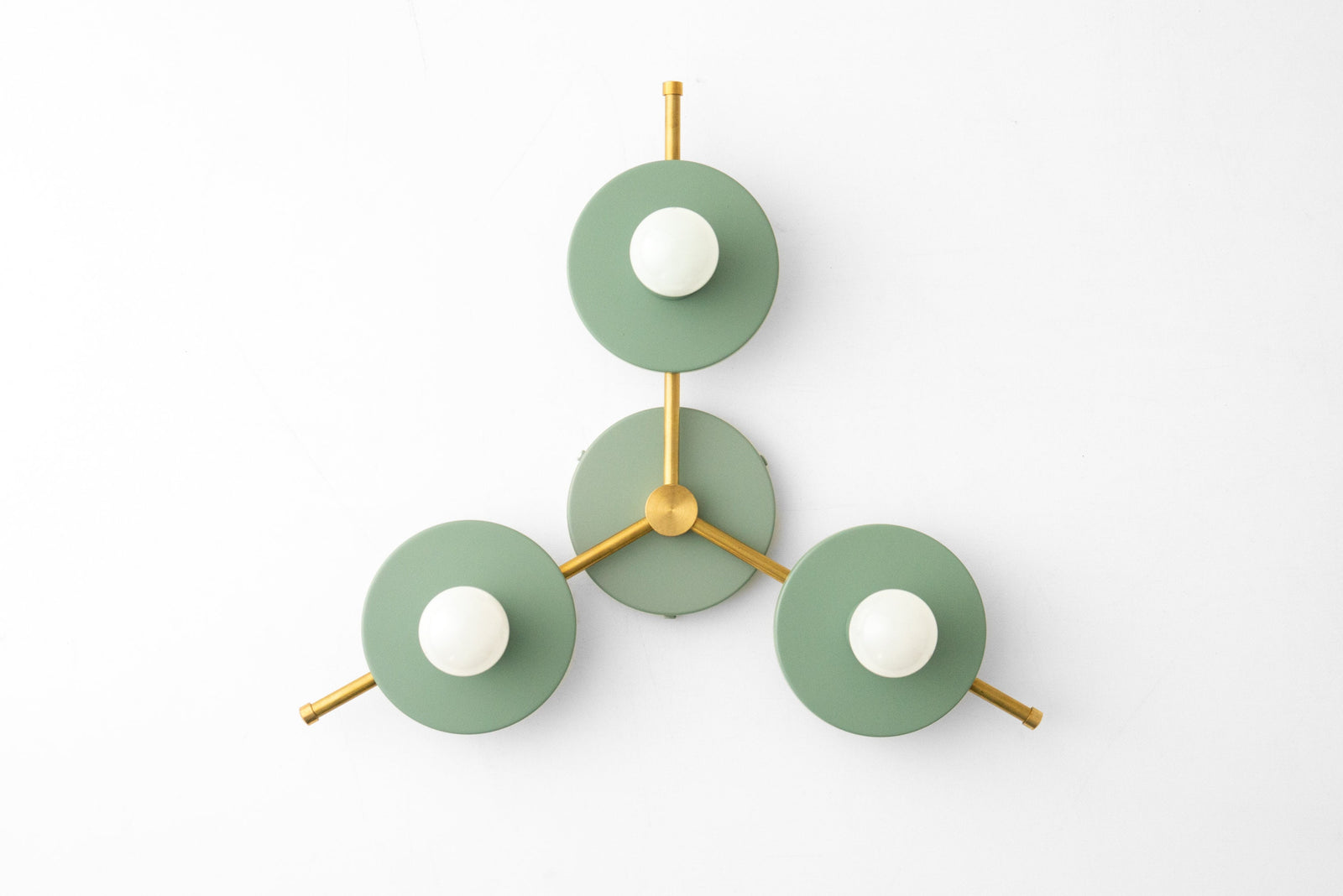 Mid-century modern chandelier with three raw brass arms and green circular shades, flush mount design. - CHANDELIER MODEL NO. 9526
