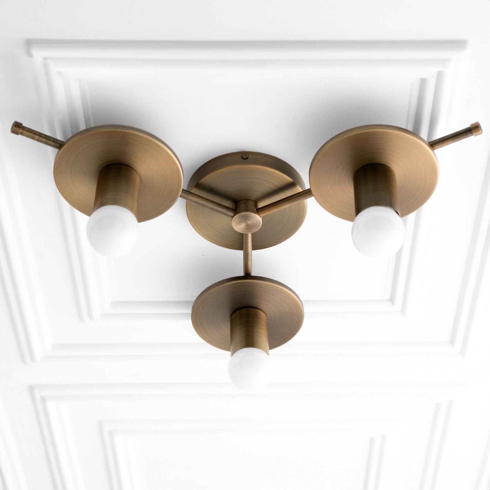 Antique brass flush mount chandelier with four round shades and exposed bulbs. - CHANDELIER MODEL NO. 9526