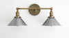 VANITY MODEL No. 0799- Industrial bathroom lighting with a Antique Brass finish. Designed and produced by newwineoldbottles at Peared Creation