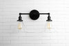 VANITY MODEL No. 1464- Industrial bathroom lighting with a Black finish. Designed and produced by newwineoldbottles at Peared Creation