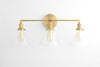 VANITY MODEL No. 5219- Mid Century Modern bathroom lighting with a Raw Brass finish. Designed and produced by MODCREATIONStudio at Peared Creation