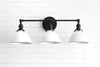 VANITY MODEL No. 0085- Industrial bathroom lighting with a Black finish. Designed and produced by newwineoldbottles at Peared Creation