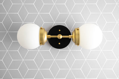 VANITY MODEL No. 2599-Art Deco bathroom lighting with a Black/Brass finish. Designed and produced by DECOCREATIONStudio at Peared Creation