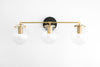 VANITY MODEL No. 4357- Mid Century Modern bathroom lighting with a Black/Brass finish. Designed and produced by MODCREATIONStudio at Peared Creation