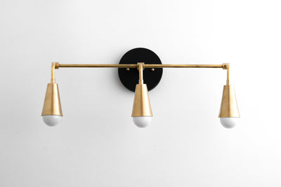 VANITY MODEL No. 3970- Mid Century Modern bathroom lighting with a Black/Brass finish. Designed and produced by MODCREATIONStudio at Peared Creation