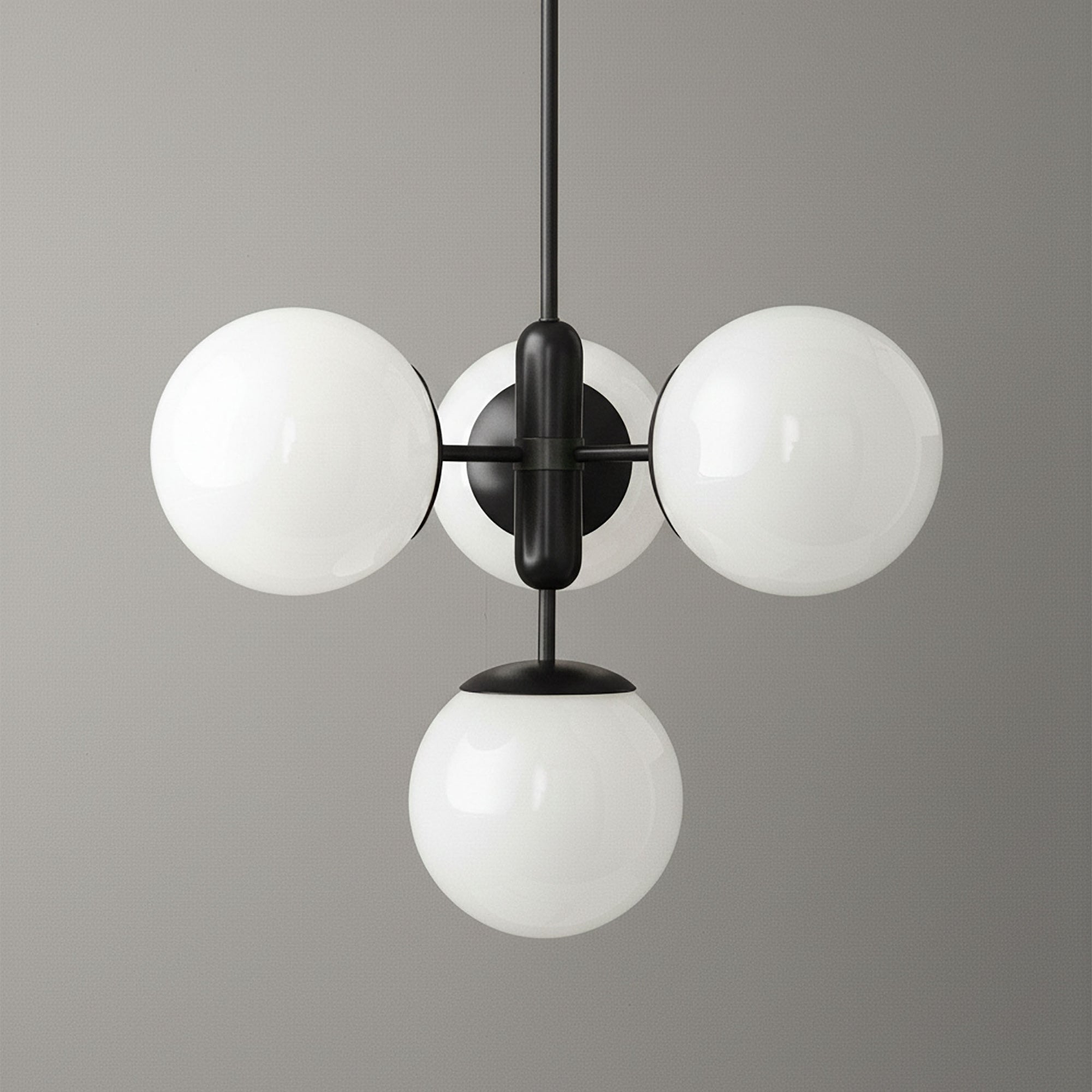 Art Deco chandelier with three white glass globes on black metal frame suspended from ceiling. - CHANDELIER MODEL NO. 4321