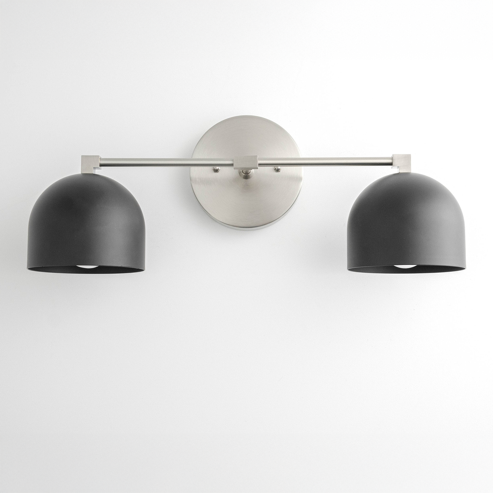 Mid-century modern vanity light with two matte black dome shades and brushed nickel wall mount. - VANITY LIGHT MODEL NO. 0698