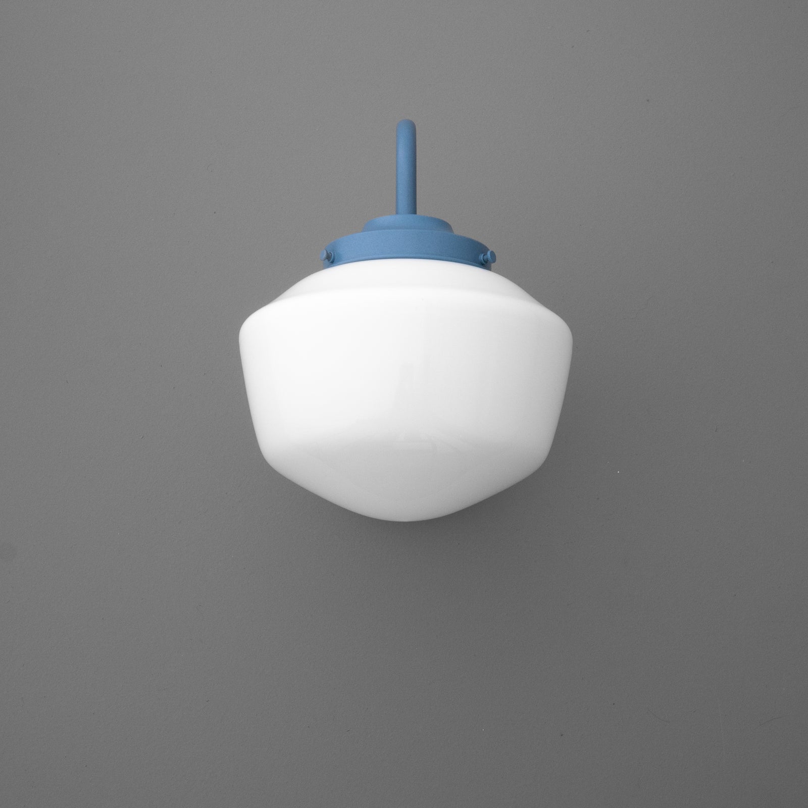 Front view of the opal glass schoolhouse shade below a Periwinkle gooseneck arm and fitter. - SCONCE MODEL NO. 5446