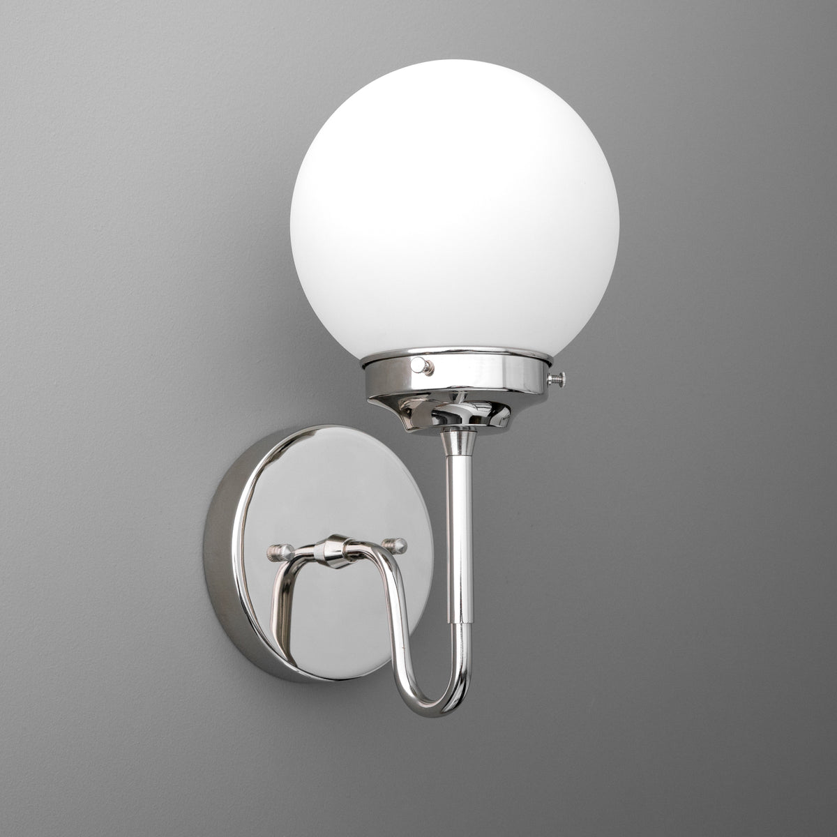 Wall sconce with polished chrome curved arm and frosted white globe shade. - SCONCE MODEL NO. 3690