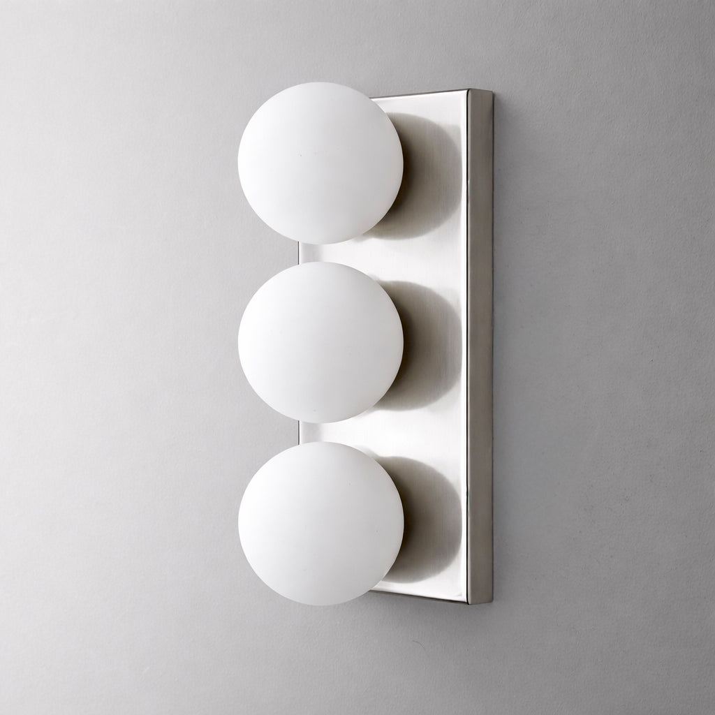 Modern white wall sconce with three evenly spaced round glass globes on a rectangular backplate. - SCONCE MODEL NO. 2623