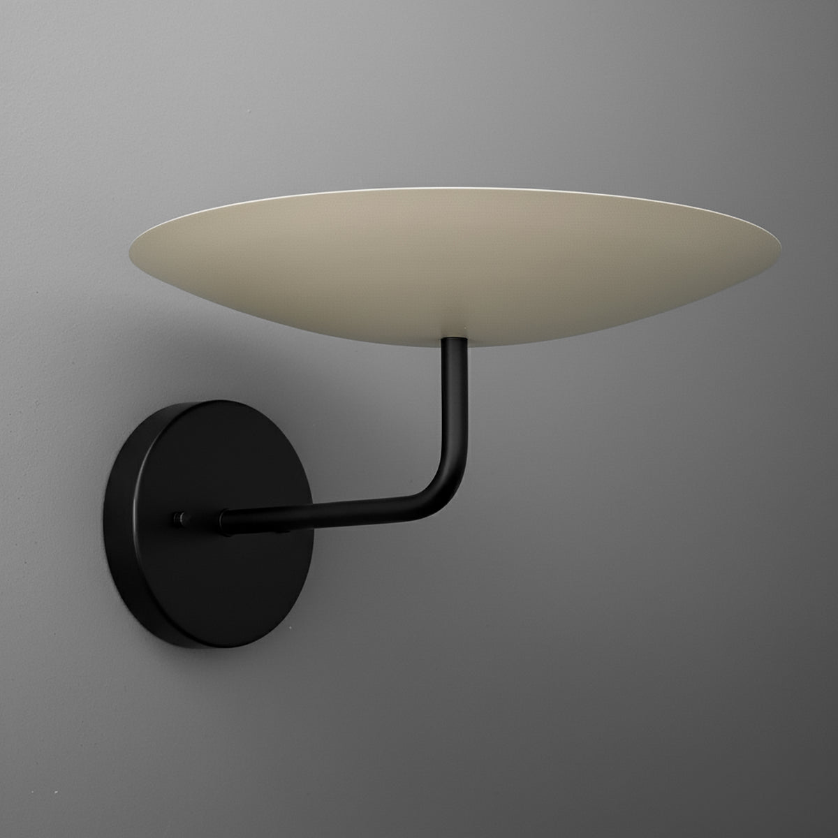 Modern black metal wall sconce with a flat, wide beige shade and a curved arm. - SCONCE MODEL NO. 1504