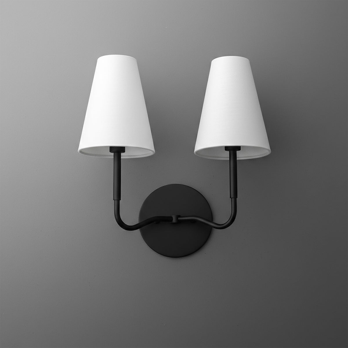 Black metal wall sconce with two upward arms and white tapered fabric shades. - SCONCE MODEL NO. 9045