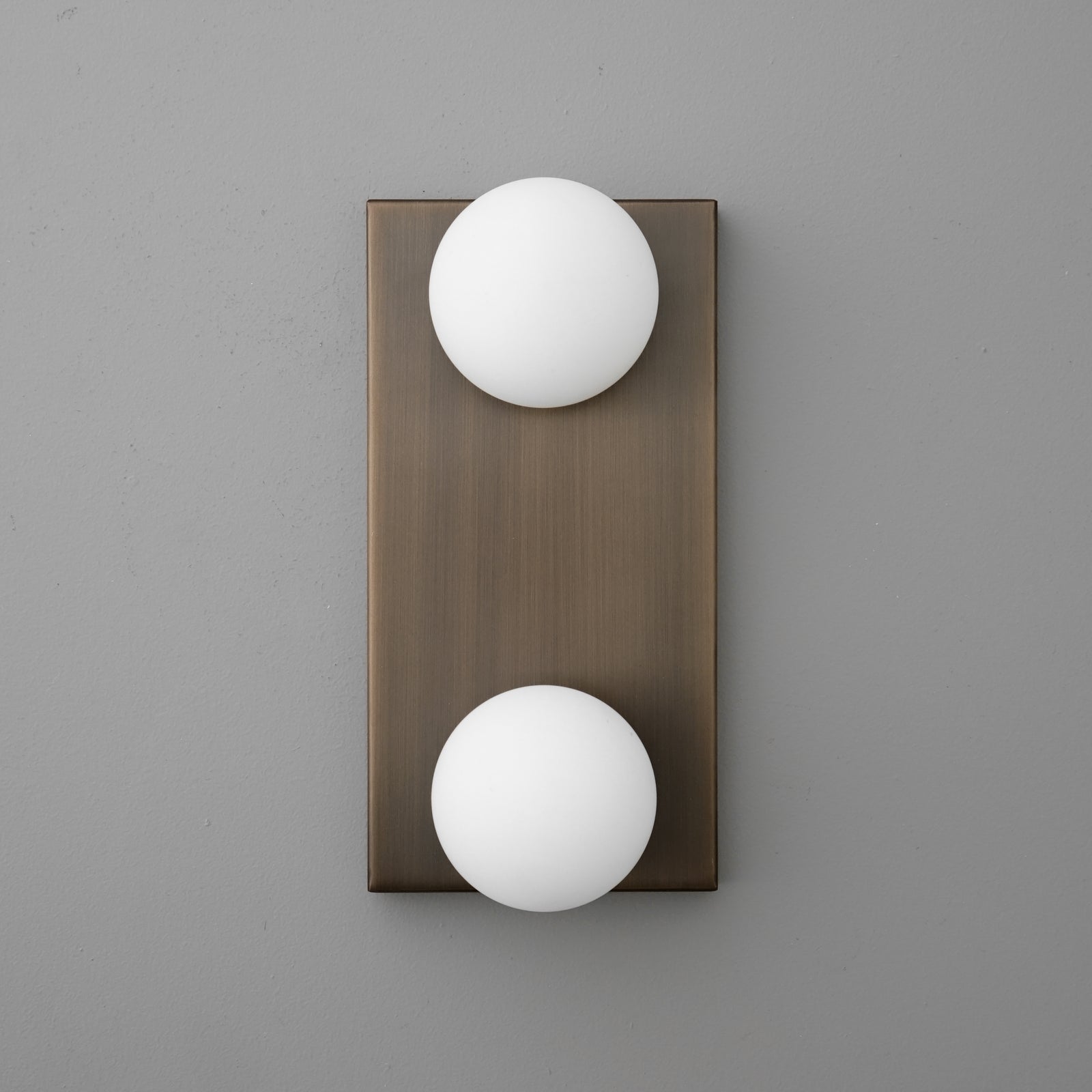 Bronze rectangular wall sconce with two white frosted glass globe shades, modern design. - SCONCE MODEL NO. 4016