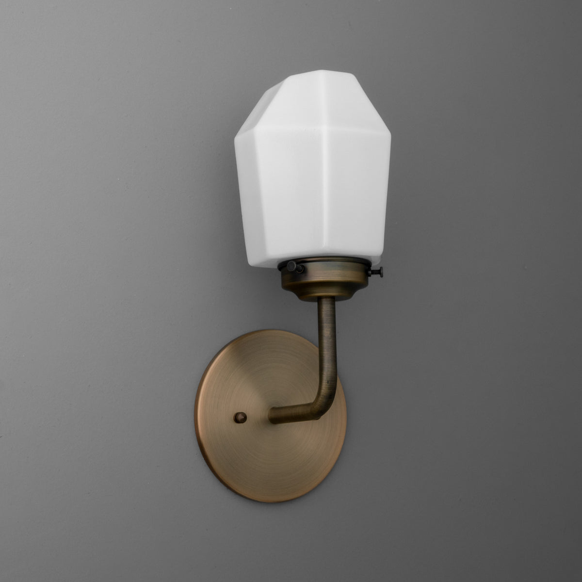 Wall-mounted sconce with octagonal white glass shade and bronze-finished metal base. - SCONCE MODEL NO. 1062