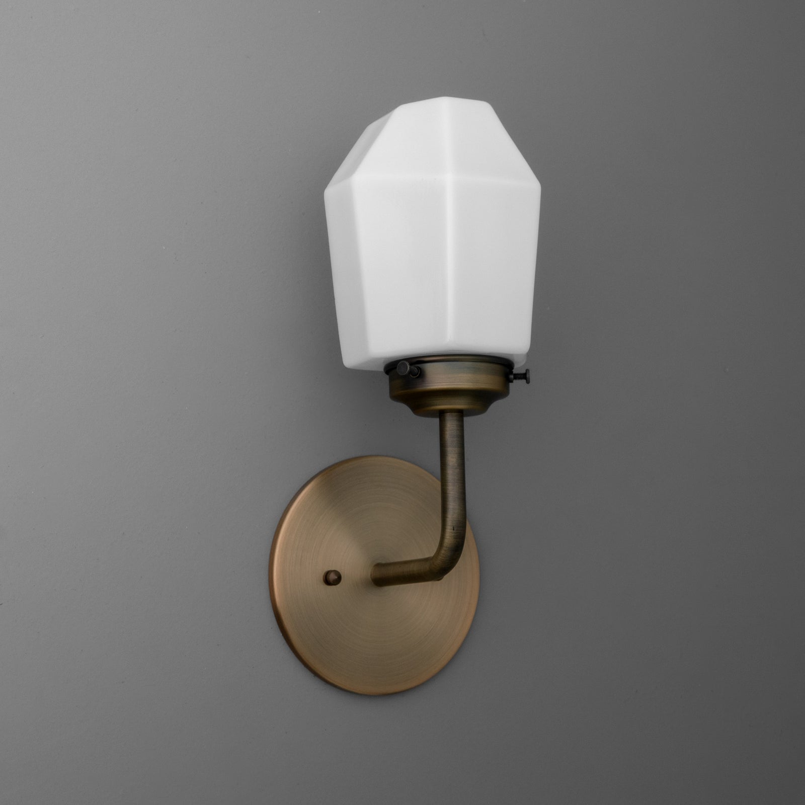 Wall-mounted sconce with octagonal white glass shade and bronze-finished metal base. - SCONCE MODEL NO. 1062