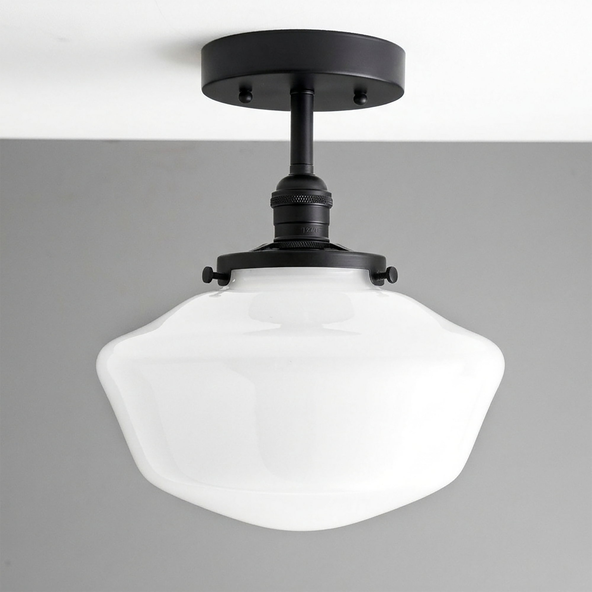 Mid-century modern semi-flush ceiling light with matte black metal fixture and white opal glass globe shade. - CEILING LIGHT MODEL NO. 9512