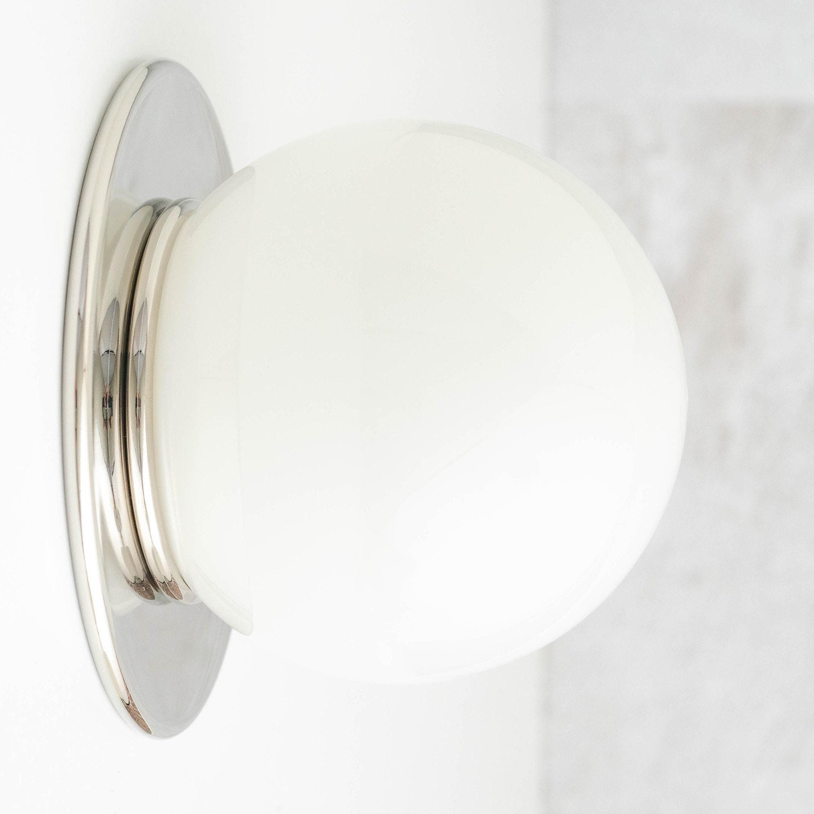 Mid-century modern flush wall sconce with polished nickel finish and white globe shade. - SCONCE MODEL NO. 9364