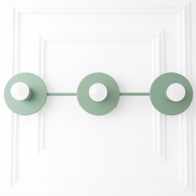 Mid-century modern vanity light with three round mint green metal bases and exposed bulbs on a horizontal bar. - VANITY LIGHT MODEL NO. 5708