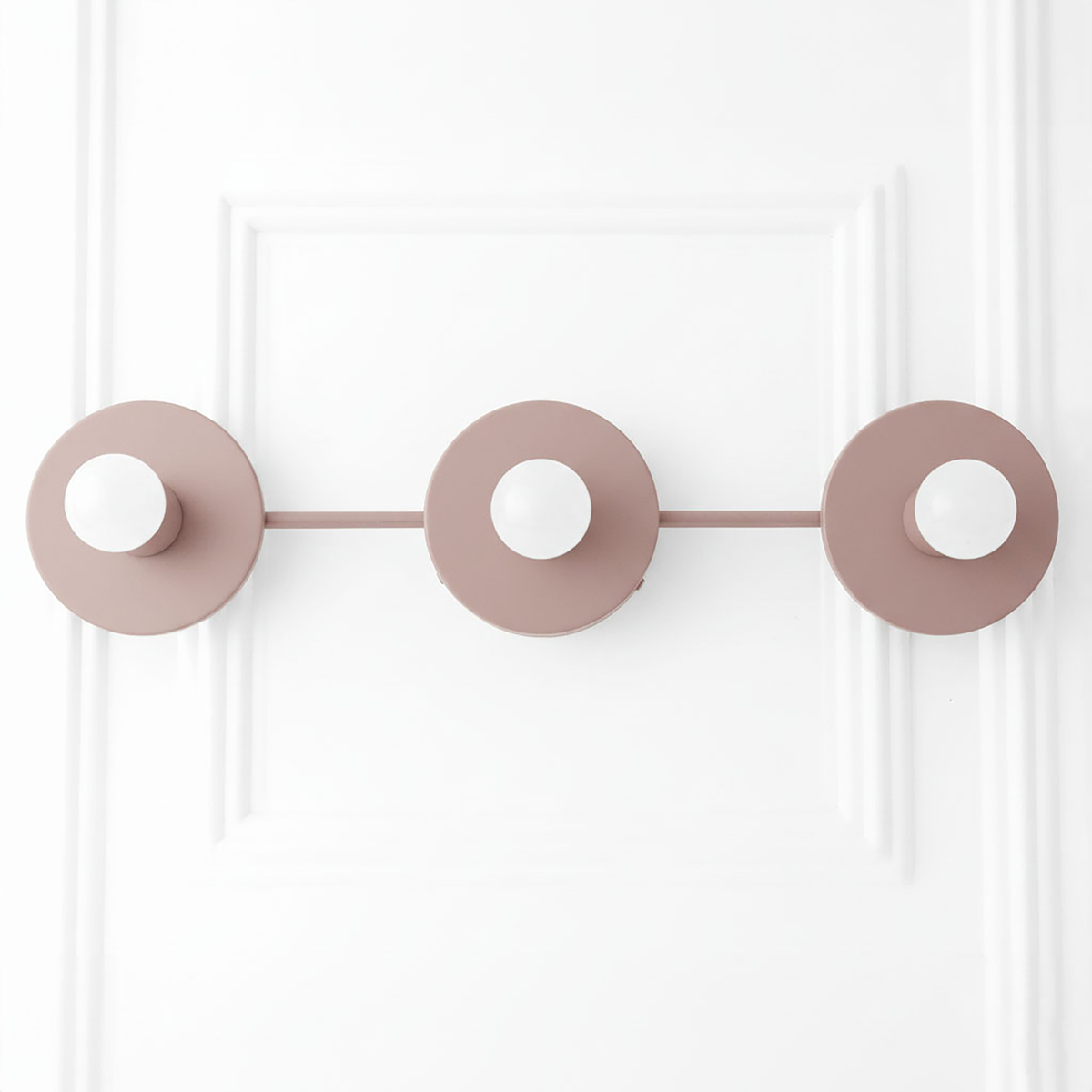 Mid-century modern mauve vanity light with three round flat shades and horizontal bar. - VANITY LIGHT MODEL NO. 5708