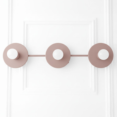 Mid-century modern mauve vanity light with three round flat shades and horizontal bar. - VANITY LIGHT MODEL NO. 5708