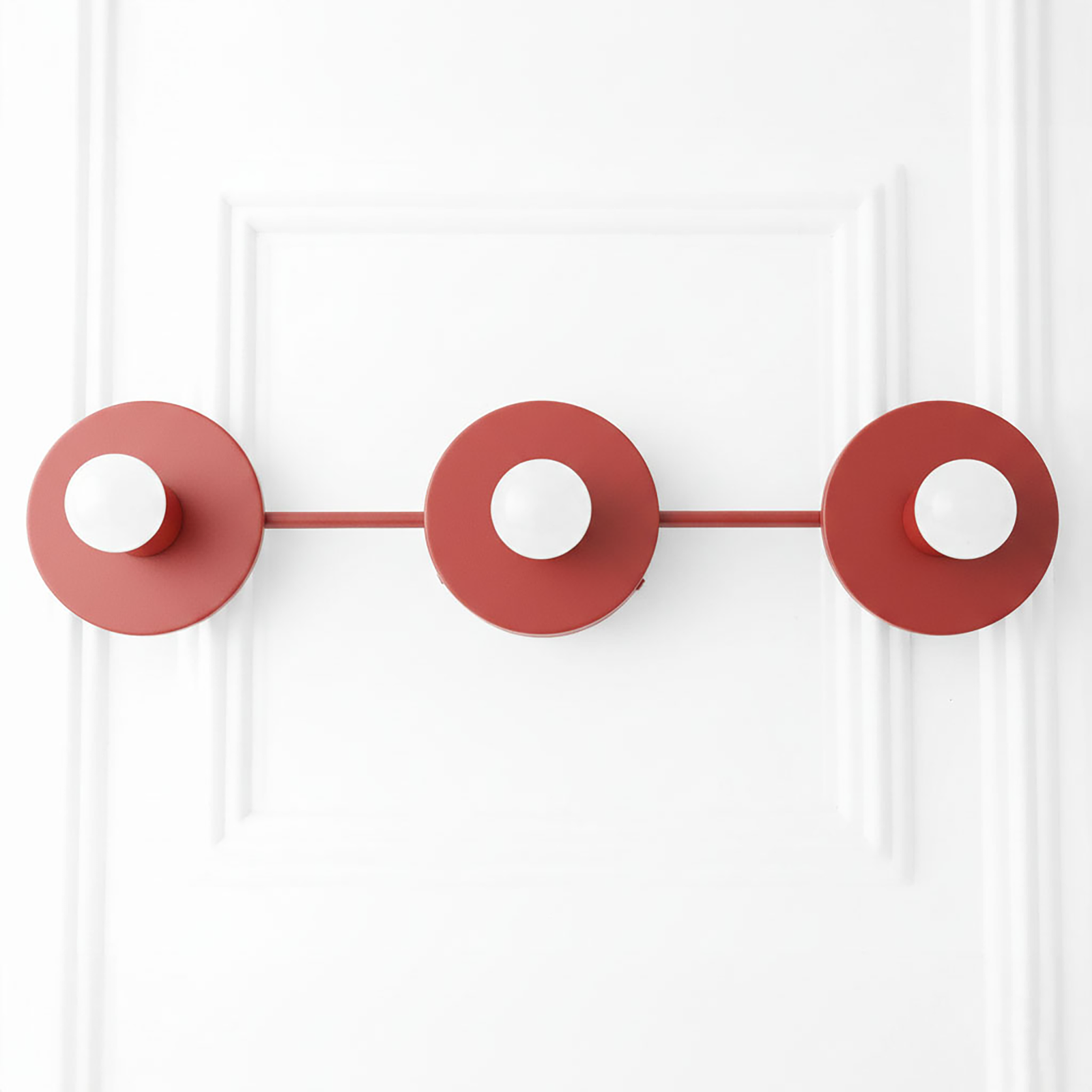 Matte red vanity light with three round bare bulb sockets in a linear mid-century modern design. - VANITY LIGHT MODEL NO. 5708