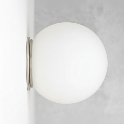 Mid-century modern polished nickel wall sconce with a white frosted glass globe shade flush mounted. - SCONCE MODEL NO. 4037