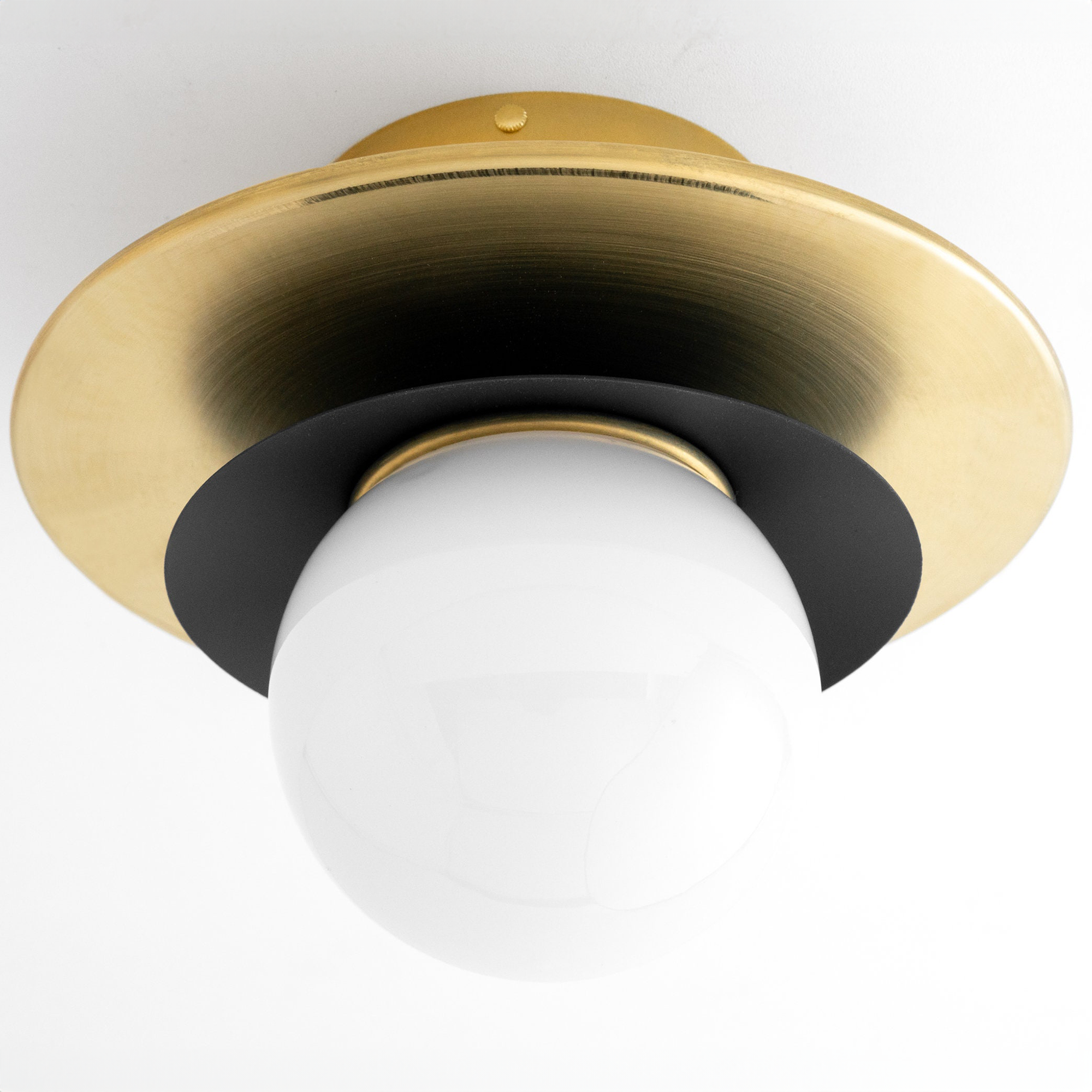 Semi-flush ceiling light with a round white globe, black accent ring, and brushed brass circular base. - CEILING LIGHT MODEL NO. 5368