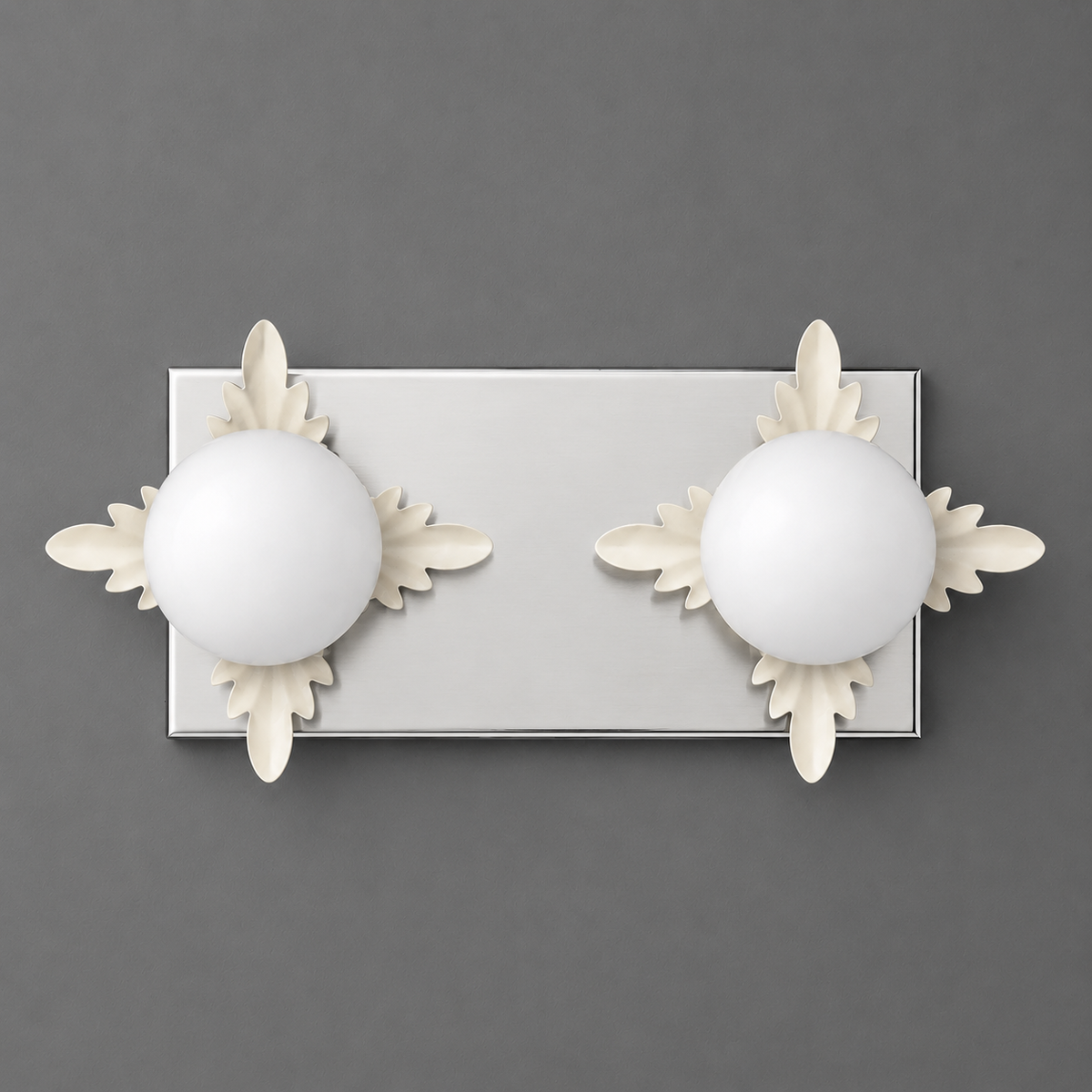 Modern rectangular metal wall sconce with two round white glass bulbs and decorative floral accents. - SCONCE MODEL NO. 1114