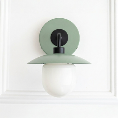 Mid-century modern green metal sconce with black fixture and white globe shade. - SCONCE MODEL NO. 7039