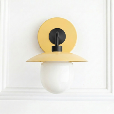 Mid-century modern sconce with matte yellow circular backplate and dome shade, frosted globe bulb. - SCONCE MODEL NO. 7039