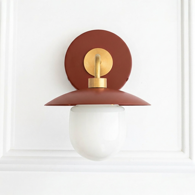Mid-century modern wall sconce with rust-colored metal shade, brass accents, and white glass globe shade. - SCONCE MODEL NO. 7039