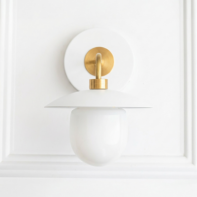 White and brass mid-century modern wall sconce with round backplate and globe shade. - SCONCE MODEL NO. 7039