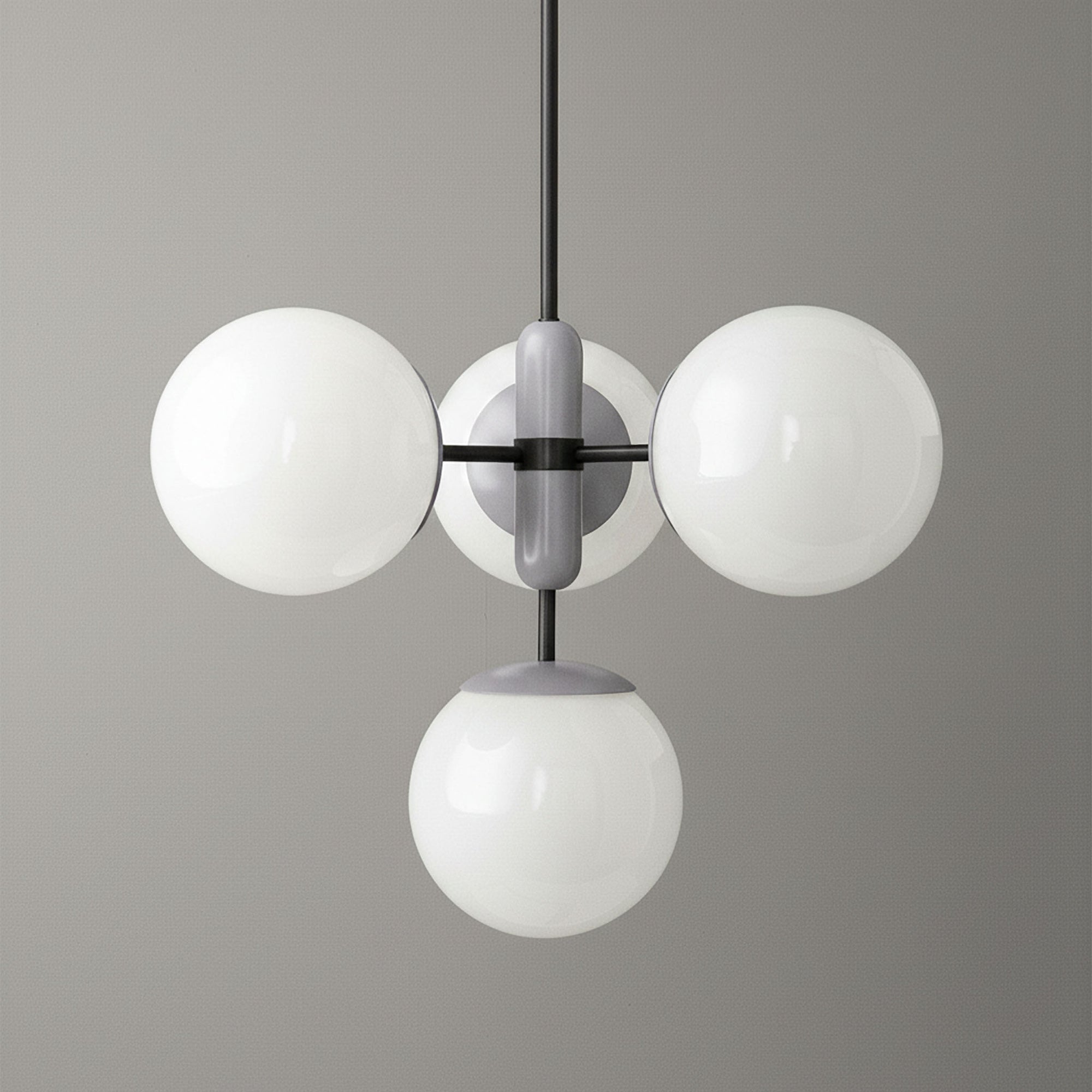 Art Deco chandelier with three white glass globes on black metal rods and central gray fixture. - CHANDELIER MODEL NO. 4321