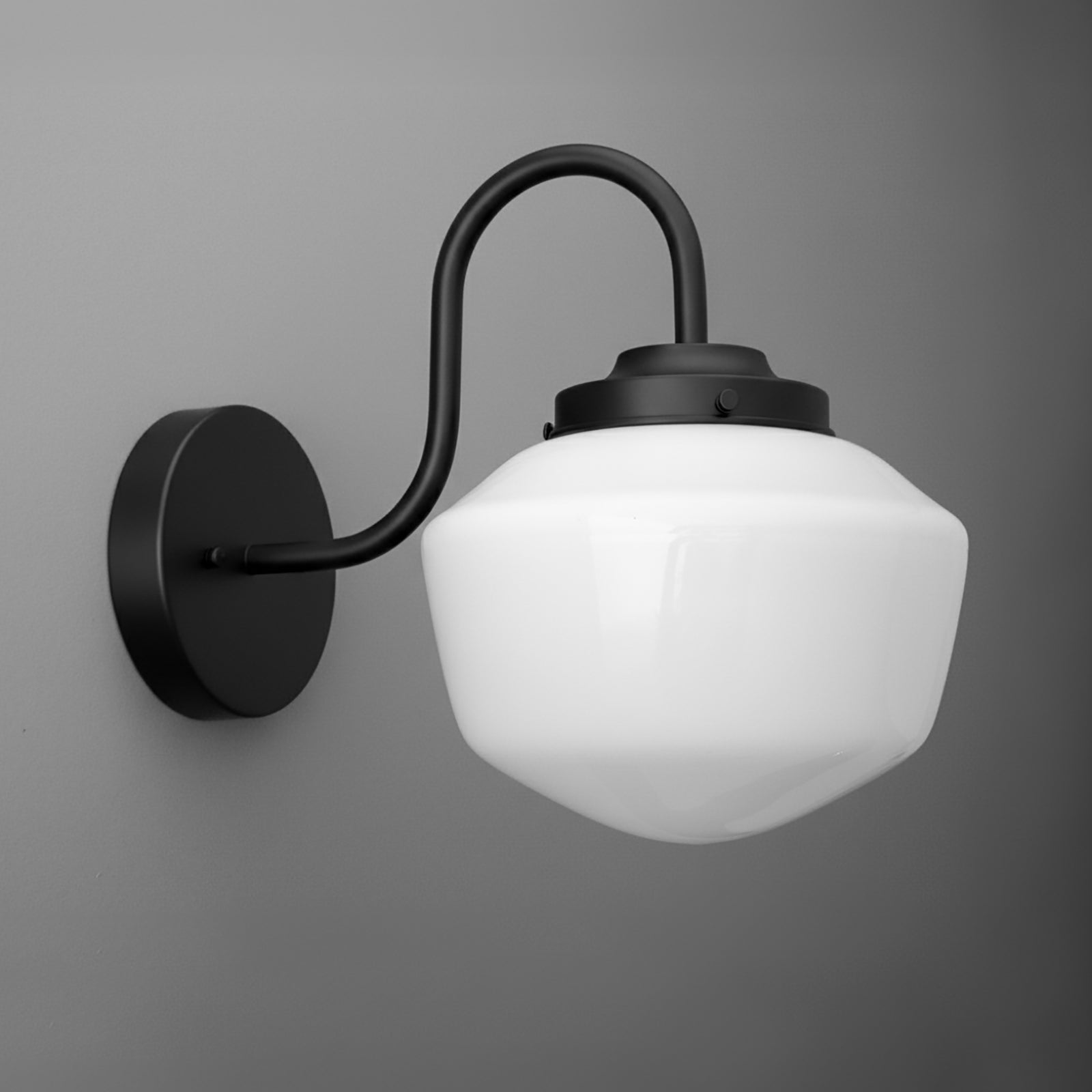 Gooseneck sconce powder coated in Black with an opal glass schoolhouse shade on a round wall plate. - SCONCE MODEL NO. 5446