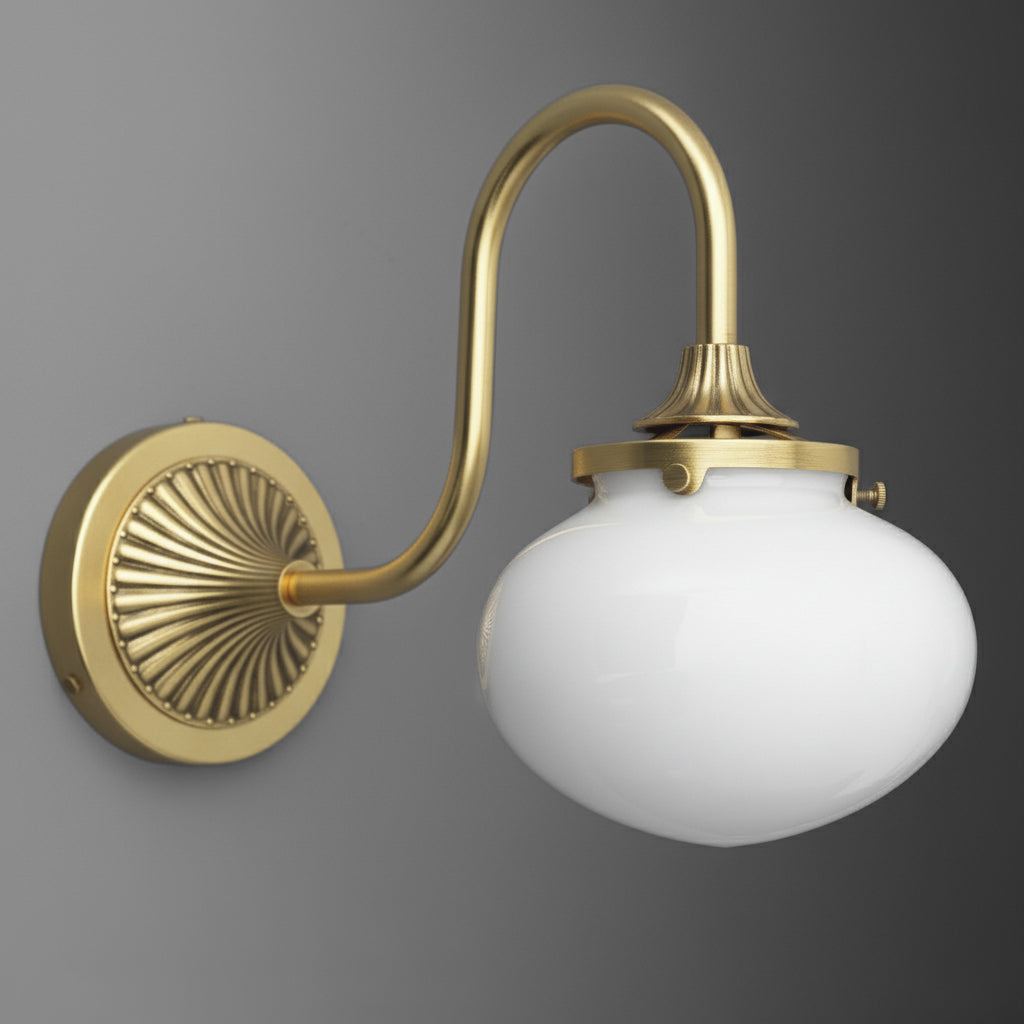 Sconce in Raw or Sealed Brass with a gooseneck arm from a fluted fan wall plate holding a round opal glass bubble shade. - SCONCE MODEL NO. 5310