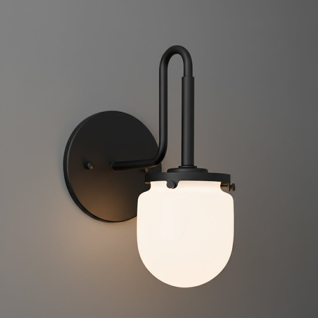 Black metal wall sconce with curved arm and frosted white glass globe shade. - SCONCE MODEL NO. 2819