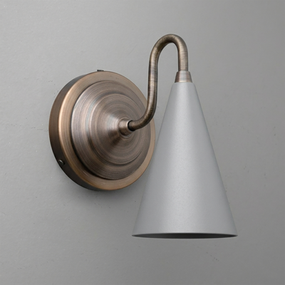 Wall-mounted metal sconce with brushed bronze circular base and curved arm supporting a matte gray conical shade. - Sconce Model No. 6790