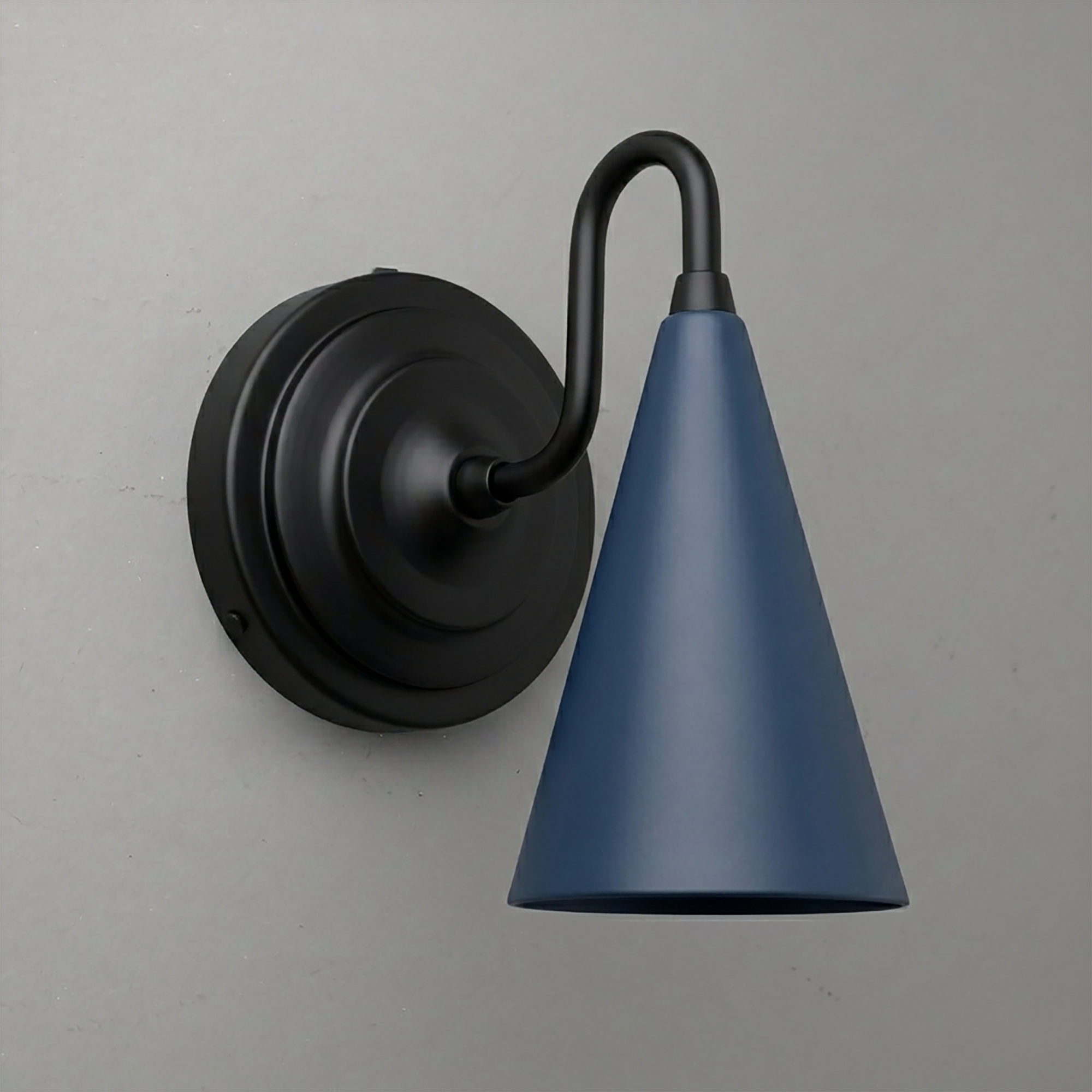 Matte black metal wall sconce with a conical blue shade and up/down light design. - Sconce Model No. 6790