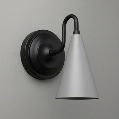 Matte black wall sconce with a round base and upward curved arm holding a silver cone-shaped shade. - Sconce Model No. 6790